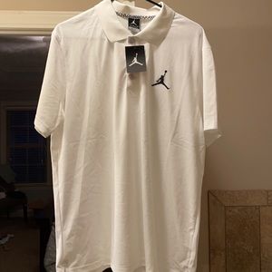 Men’s white Dri-fit polo. New with tags.
